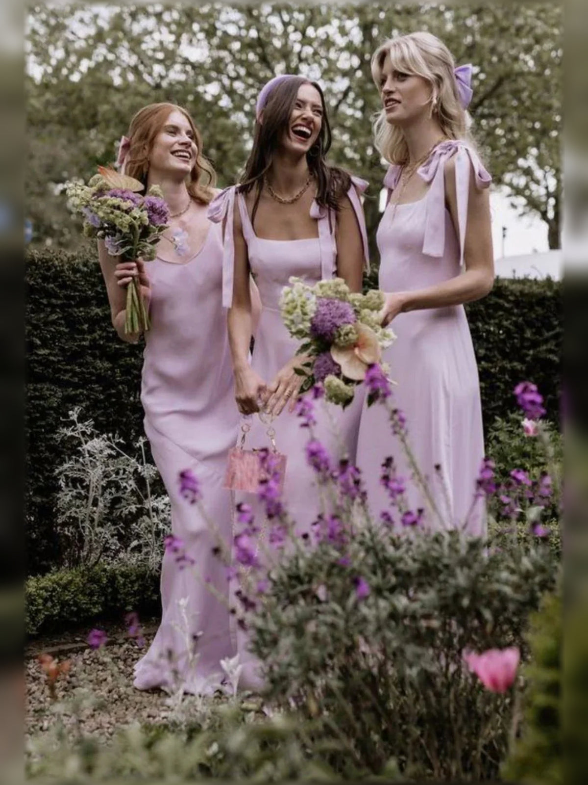 Pink floor-length bridesmaid dress, front view showing the a-line silhouette