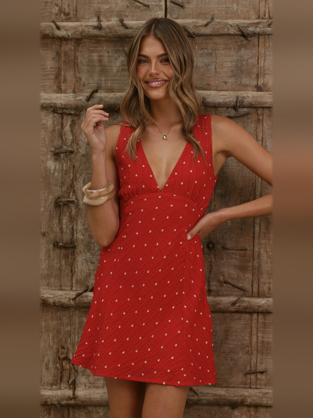 Red Floral mini homecoming dress, front view showing the silhouette