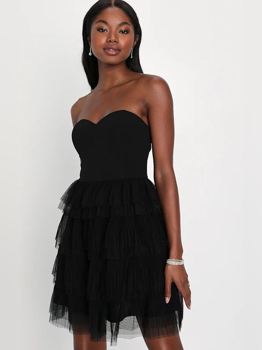 Black mini homecoming dress, front view showing the silhouette