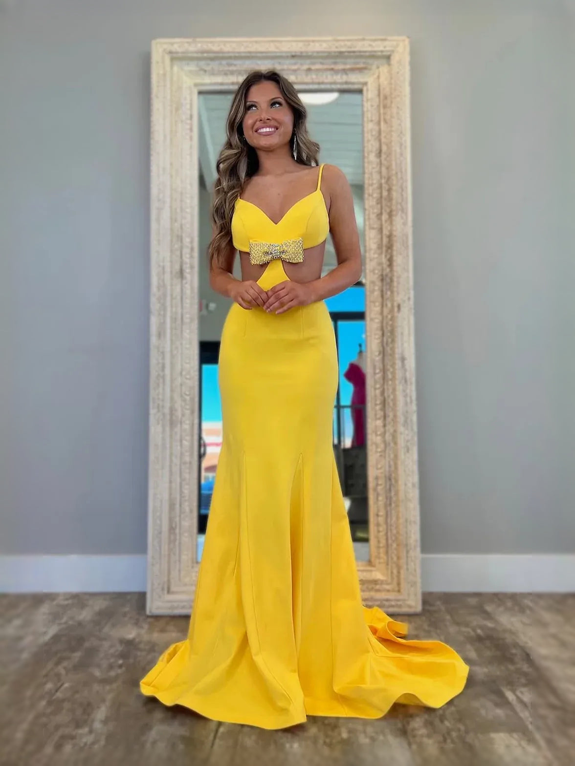 Yellow floor-length prom dress, front view showing the mermaid silhouette
