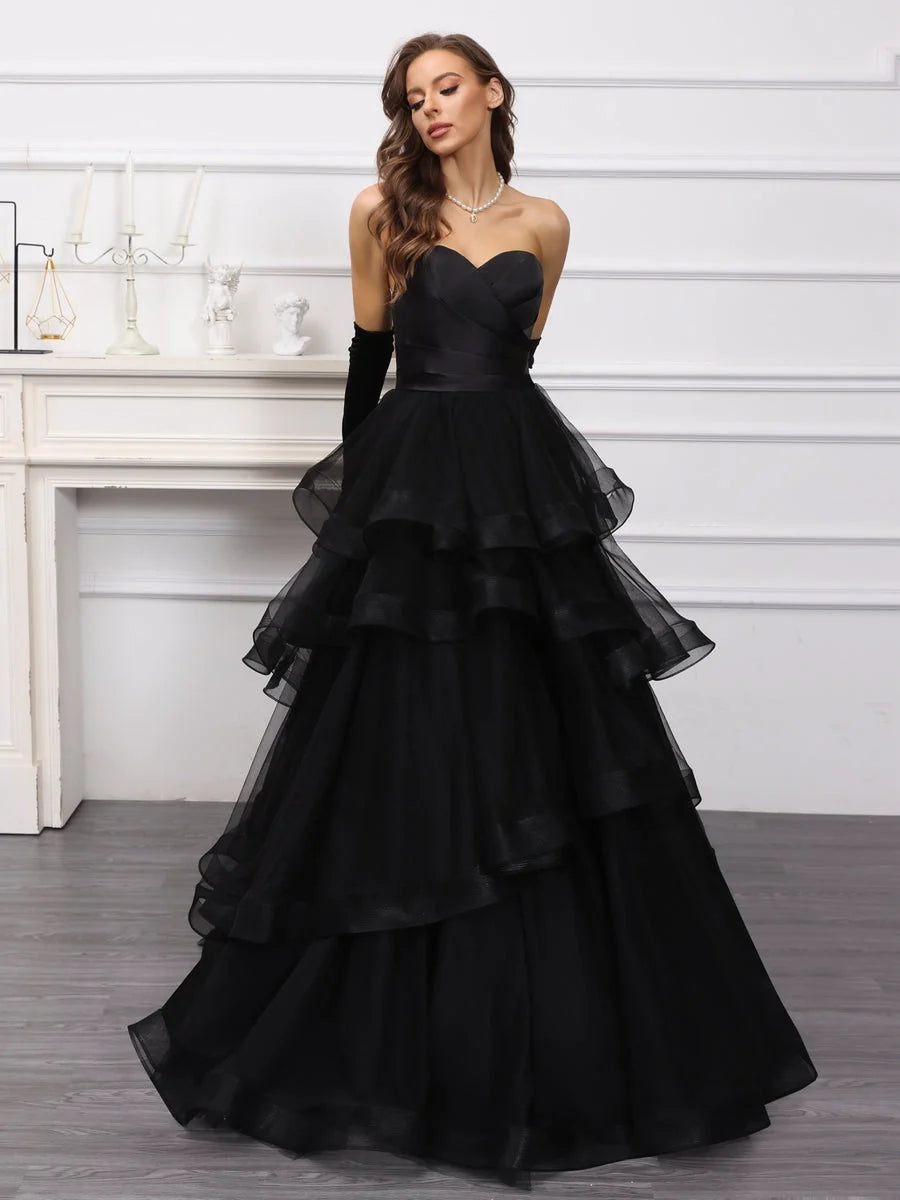 Black floor-length wedding dress, front view showing the a-line silhouette