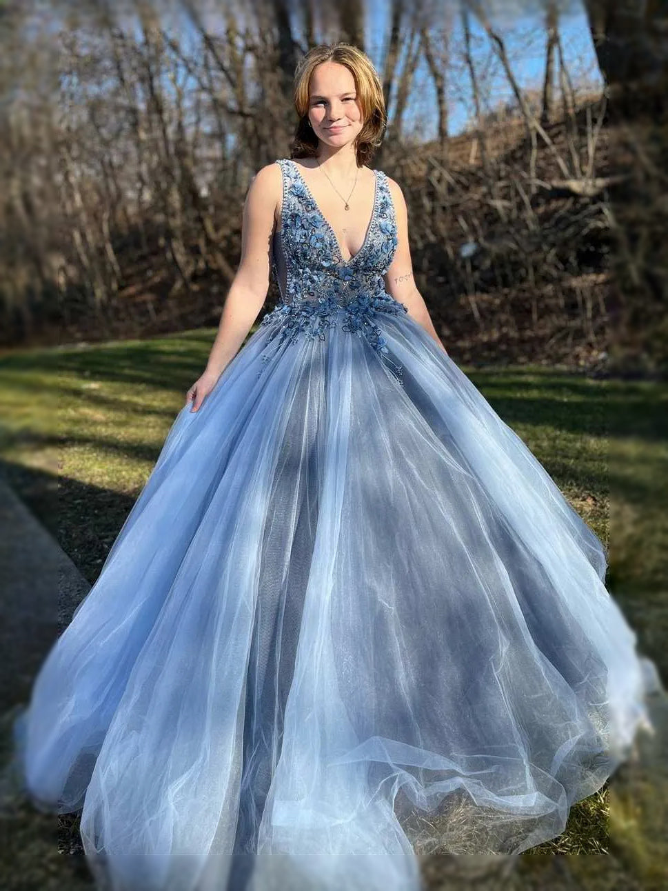 Dusty Blue maxi prom dress, front view showing the a-line silhouette