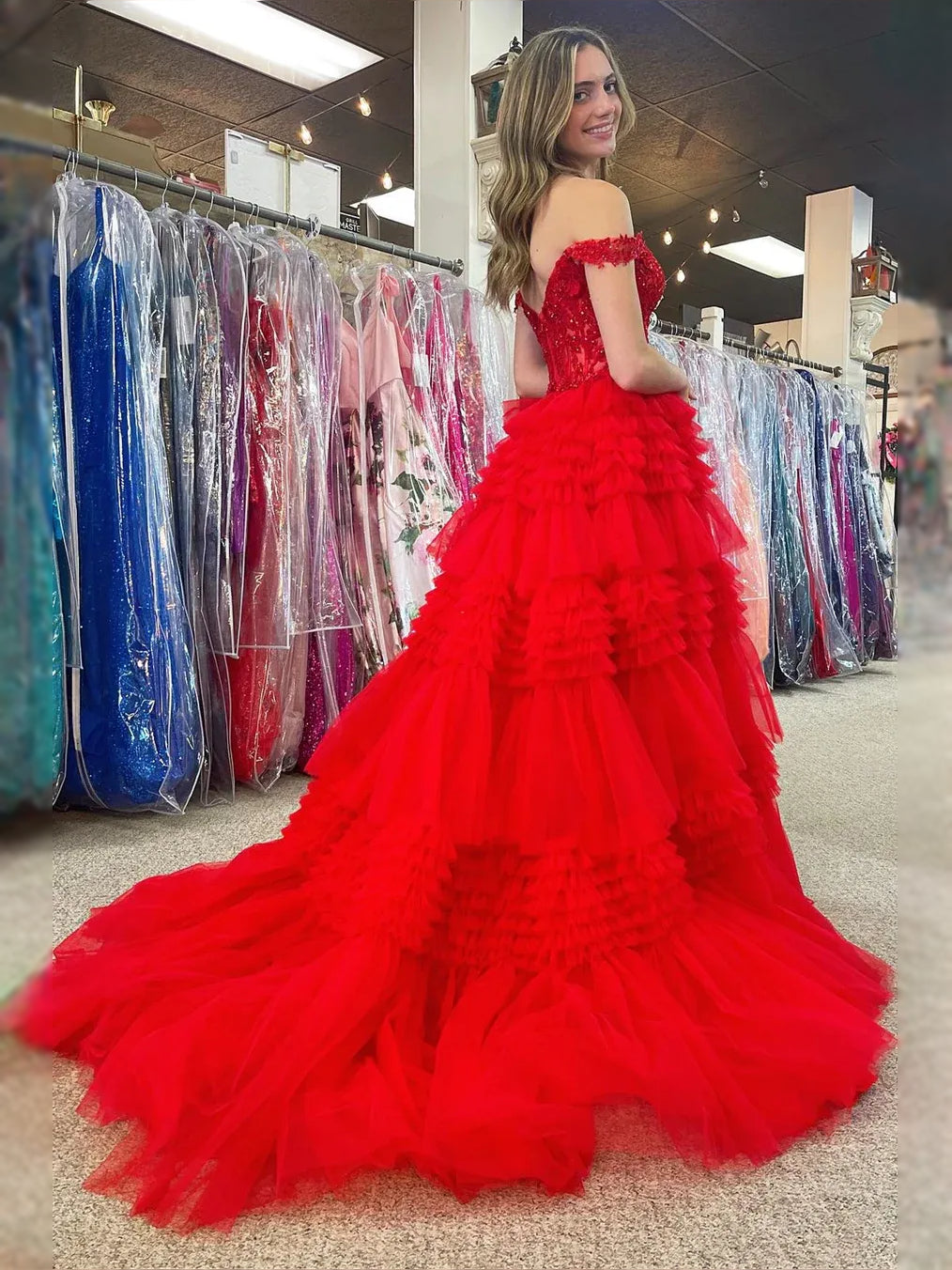 Red maxi prom dress, front view showing the ball-gown silhouette