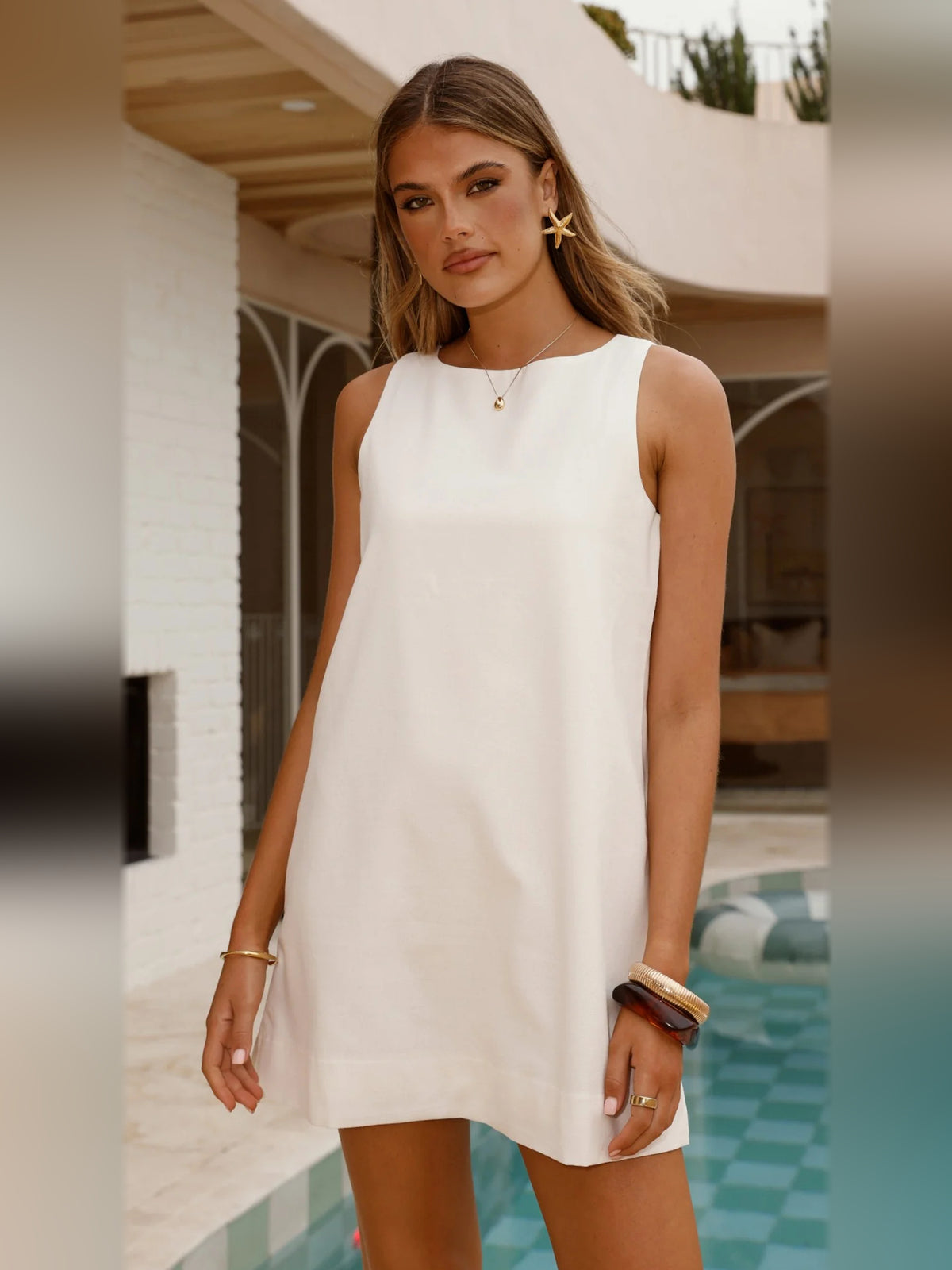 White mini homecoming dress, front view showing the silhouette