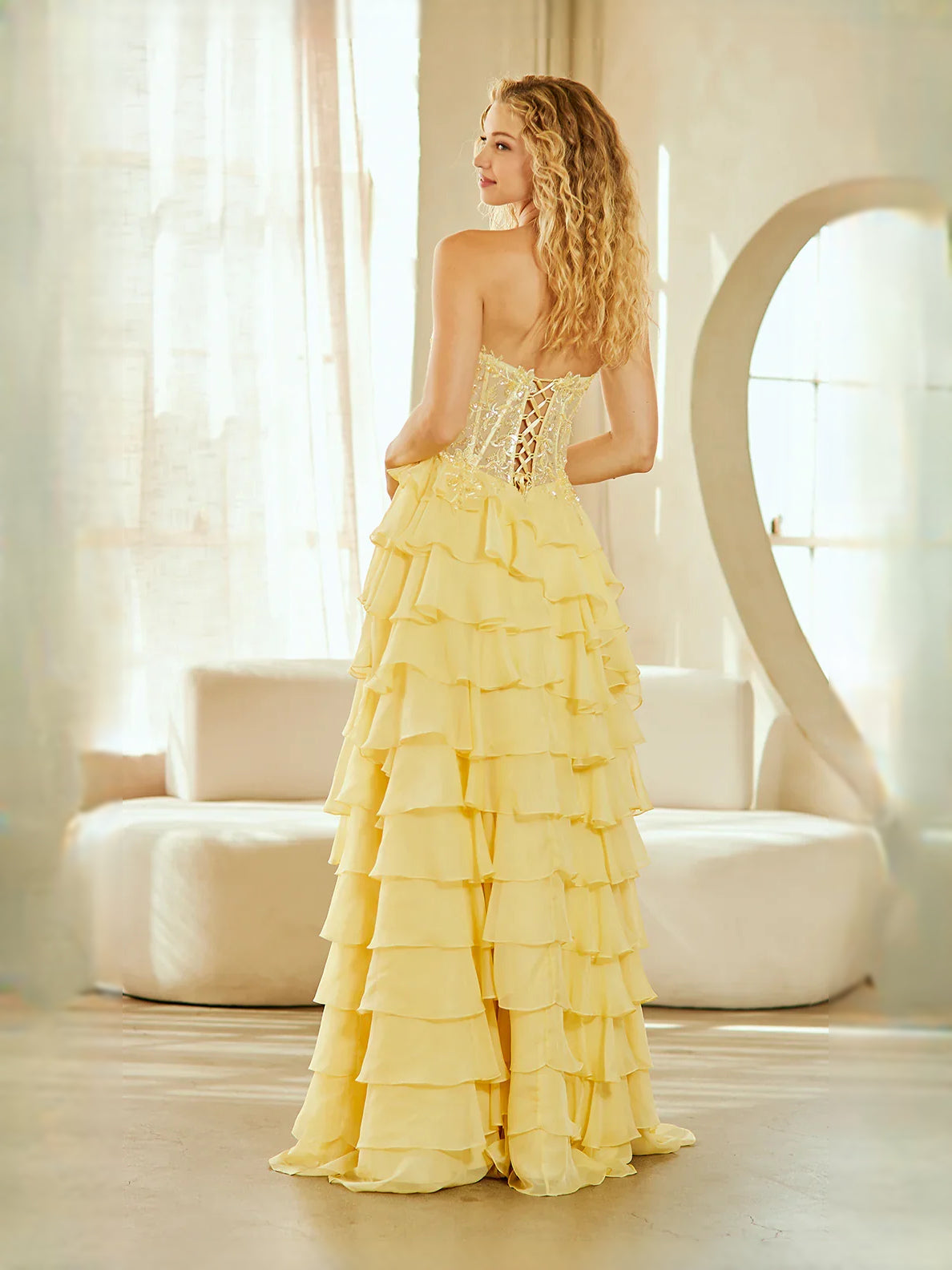 Yellow floor-length prom dress, front view showing the a-line silhouette