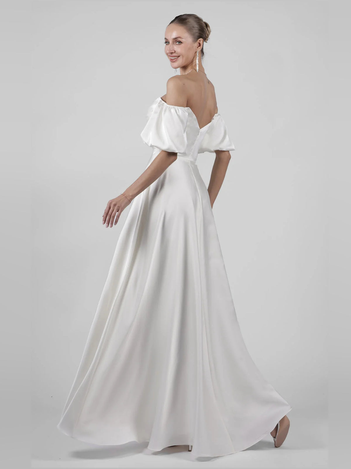 Ivory maxi wedding dress, front view showing the a-line silhouette