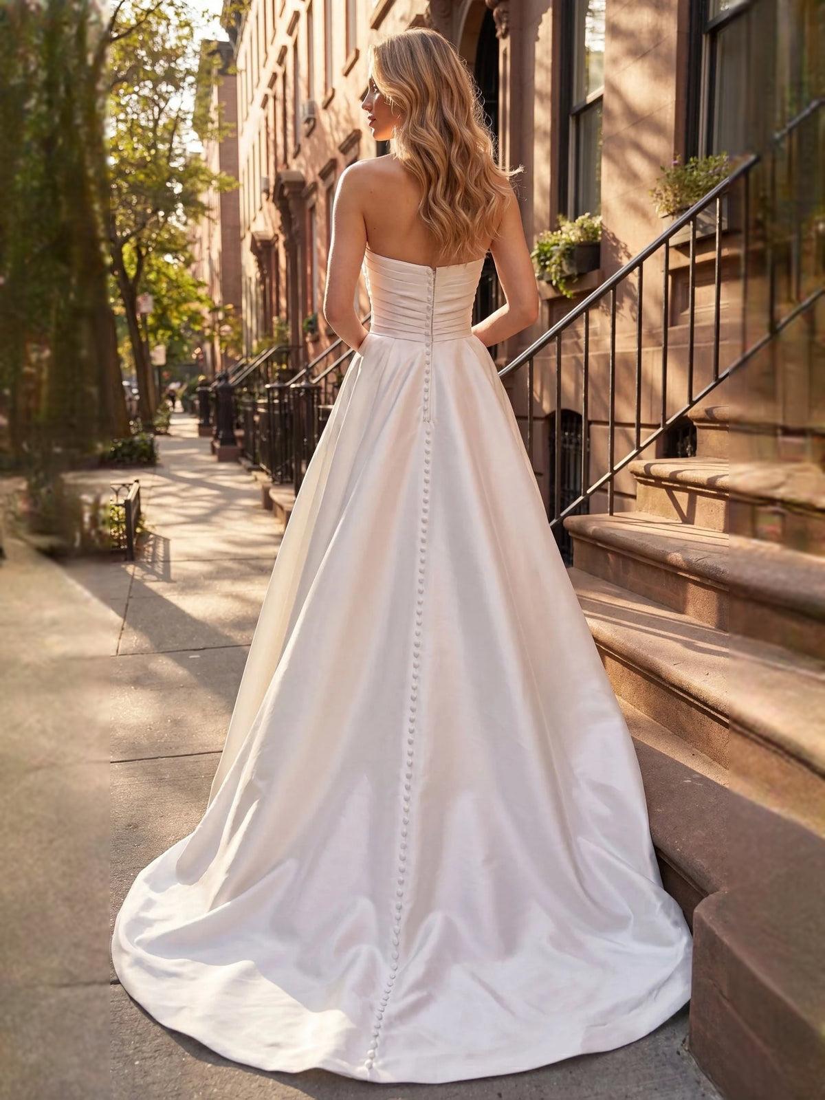 Ivory floor-length wedding dress, front view showing the column silhouette