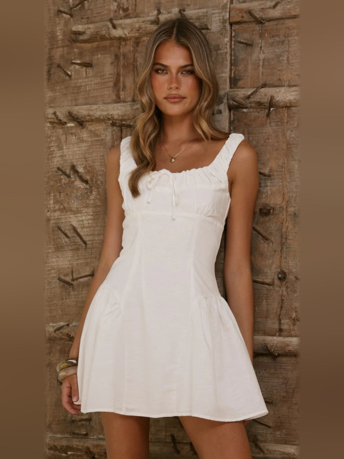 White mini homecoming dress, front view showing the silhouette