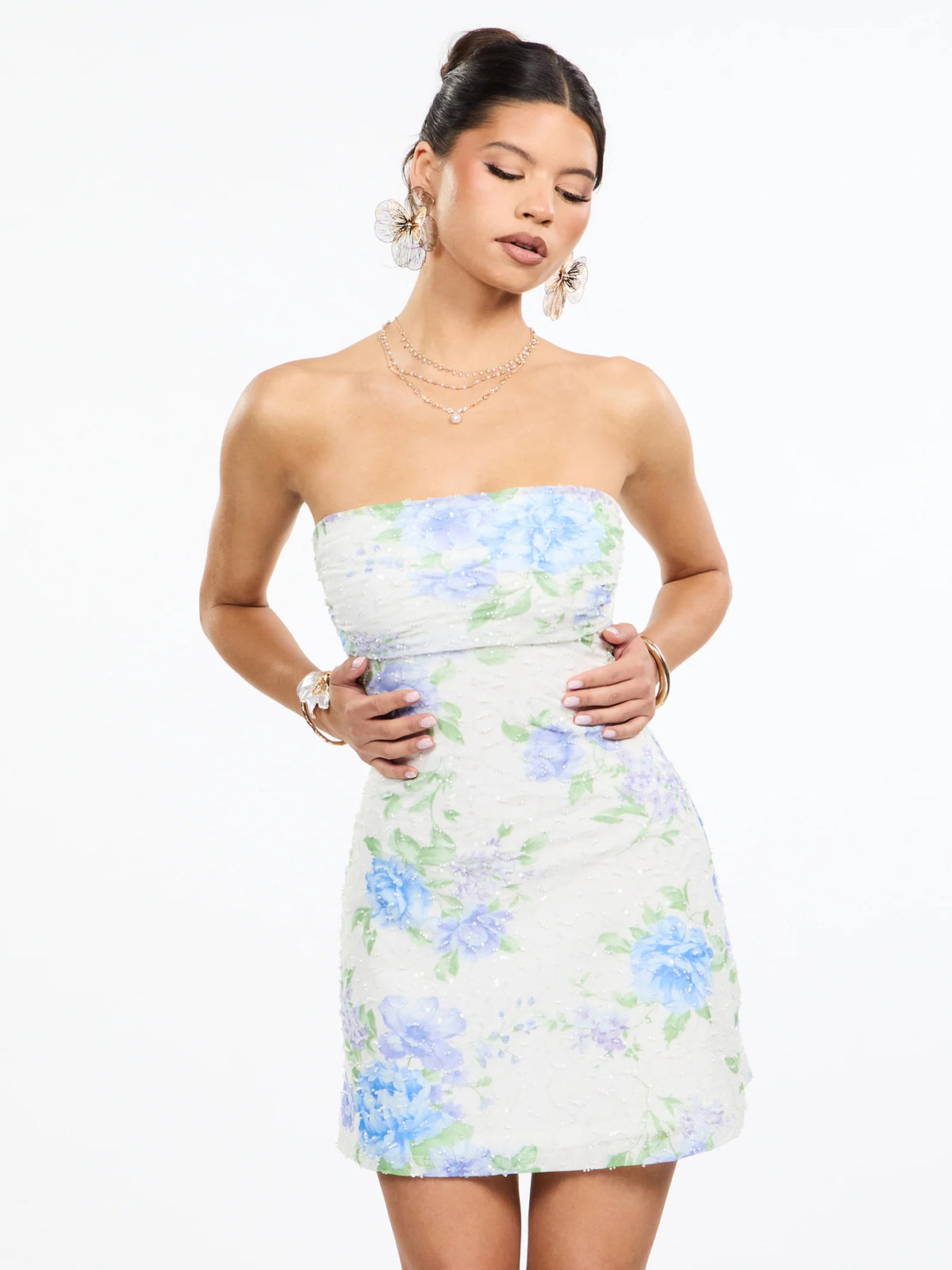 Floral mini homecoming dress, front view showing the a-line silhouette