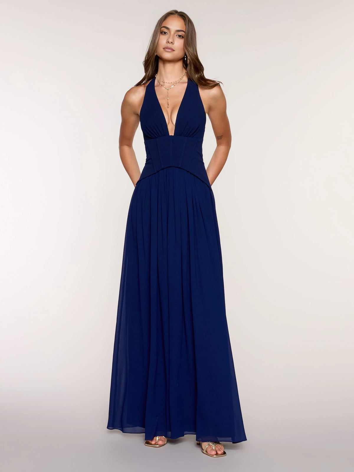 Navy floor-length prom dress, front view showing the a-line silhouette