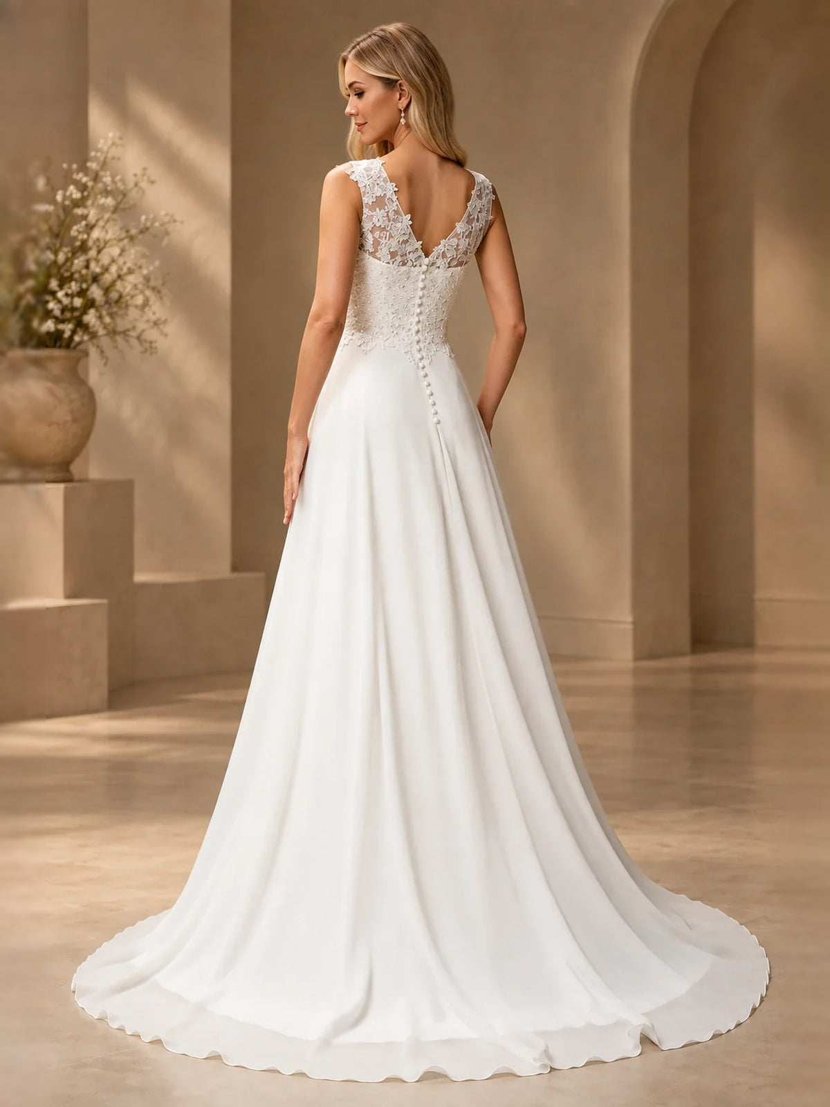 White floor-length wedding dress, front view showing the a-line silhouette