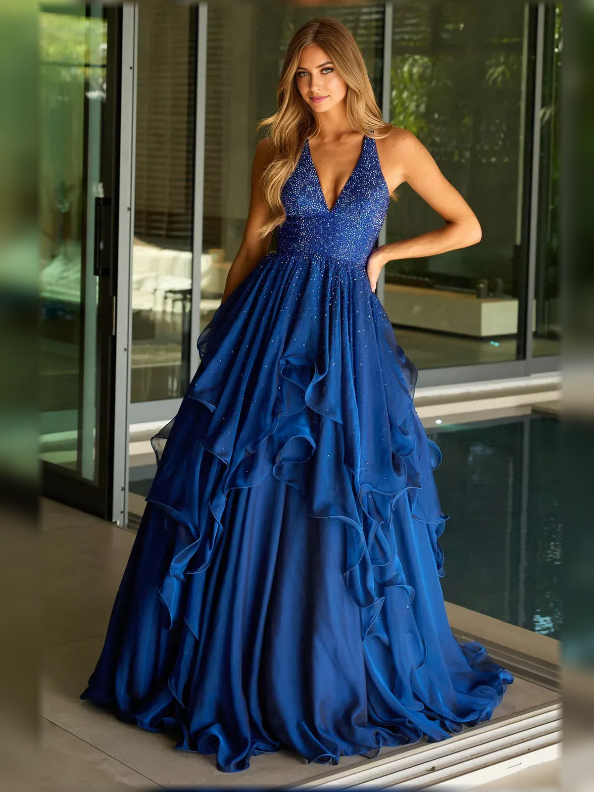Dark Blue a-line floor-length formal dress with halter neckline, full-length front view