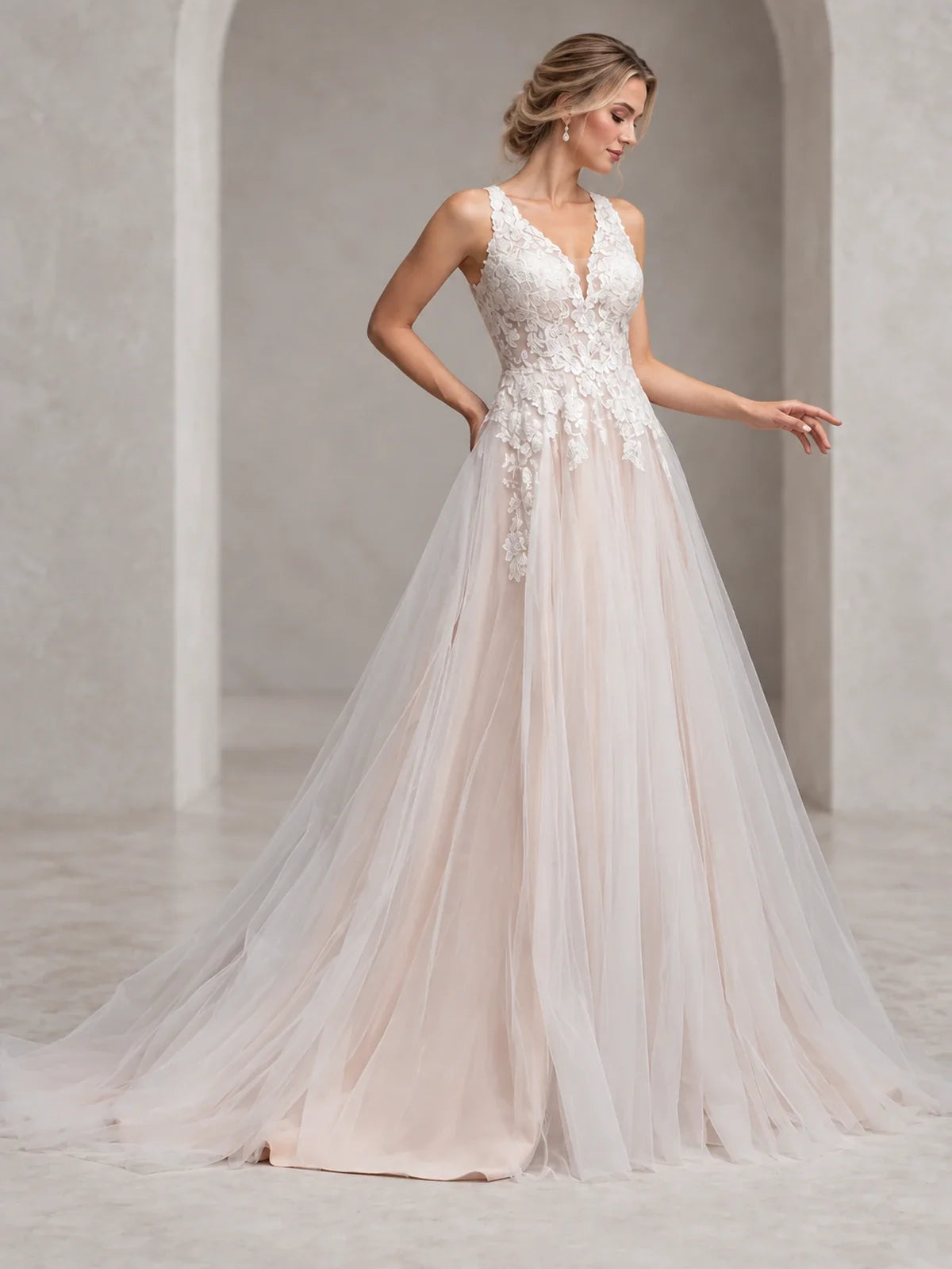 Ivory floor-length wedding dress, front view showing the a-line silhouette