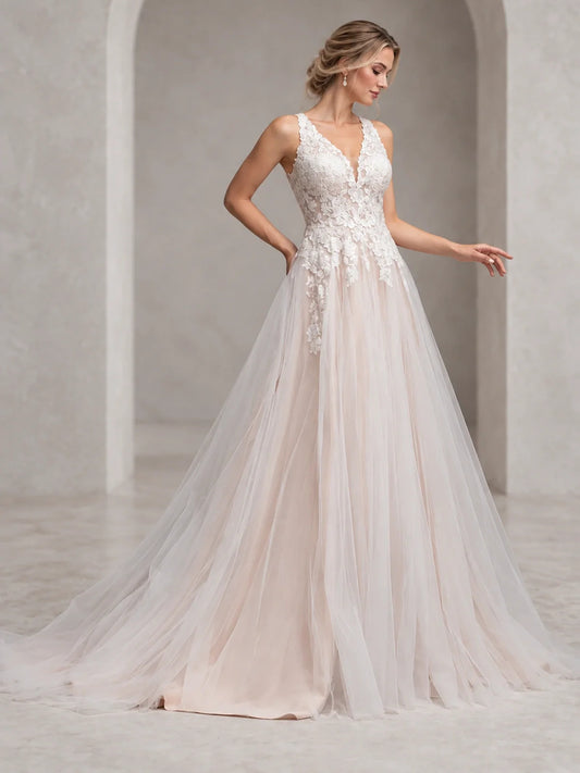 Ivory floor-length wedding dress, front view showing the a-line silhouette