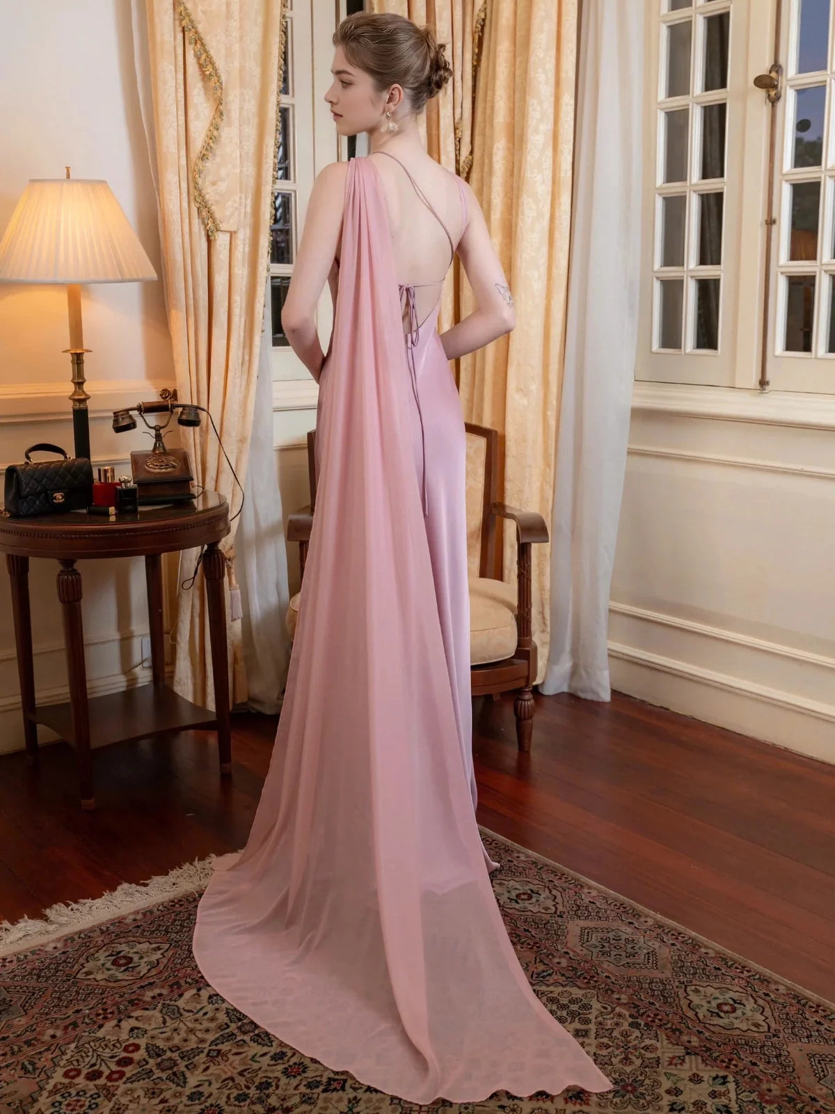 Ivory floor-length wedding dress, front view showing the mermaid silhouette