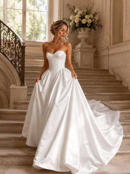 Ivory floor-length wedding dress, front view showing the ball-gown silhouette