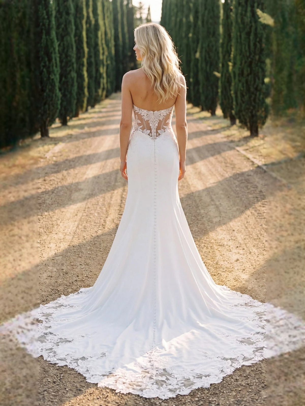 Ivory floor-length wedding dress, front view showing the mermaid silhouette