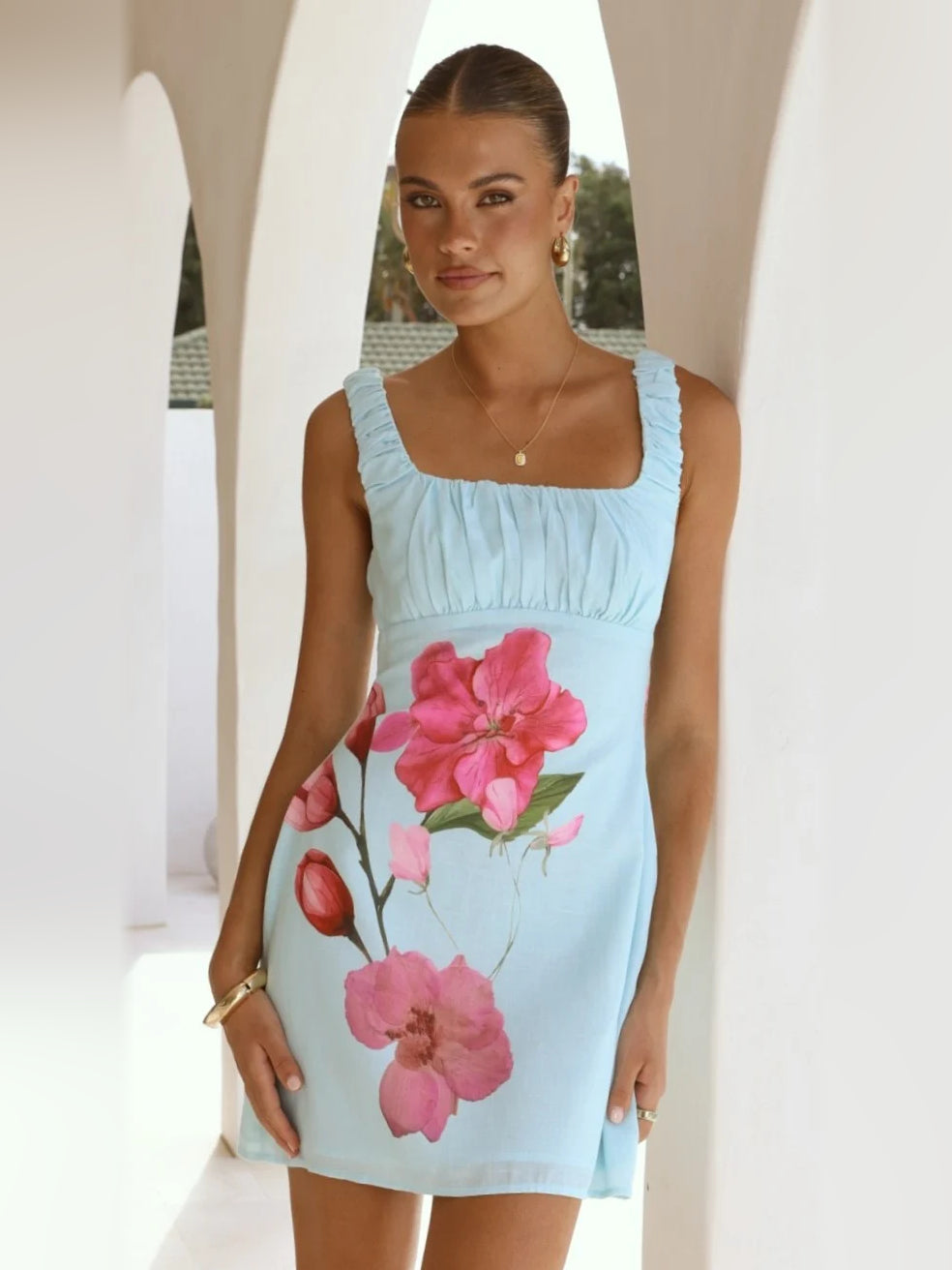Blue Pink Floral mini homecoming dress, front view showing the silhouette