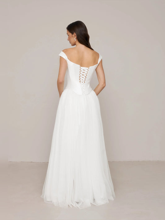 Ivory floor-length wedding dress, front view showing the a-line silhouette