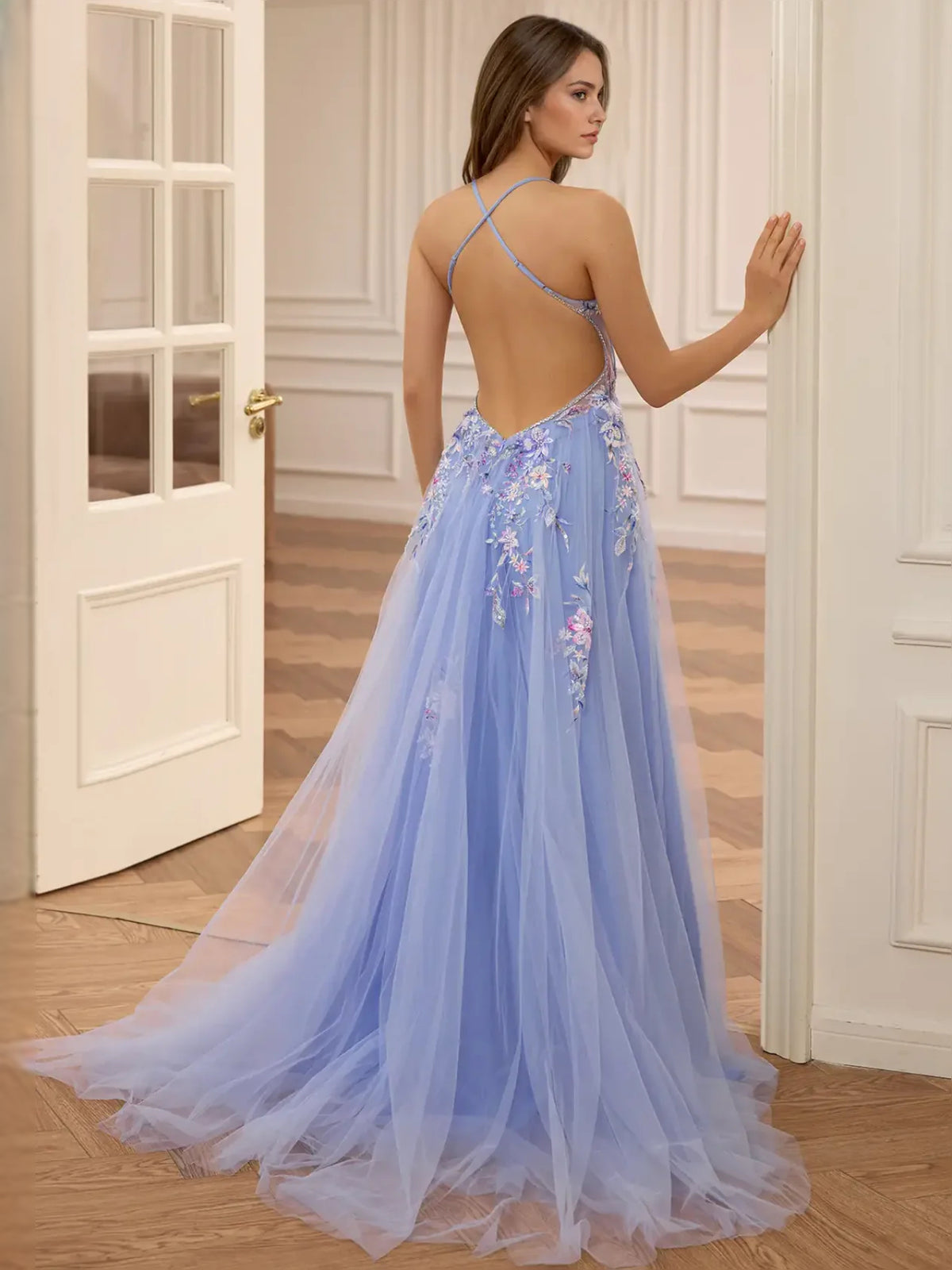 Blue floor-length prom dress, front view showing the a-line silhouette