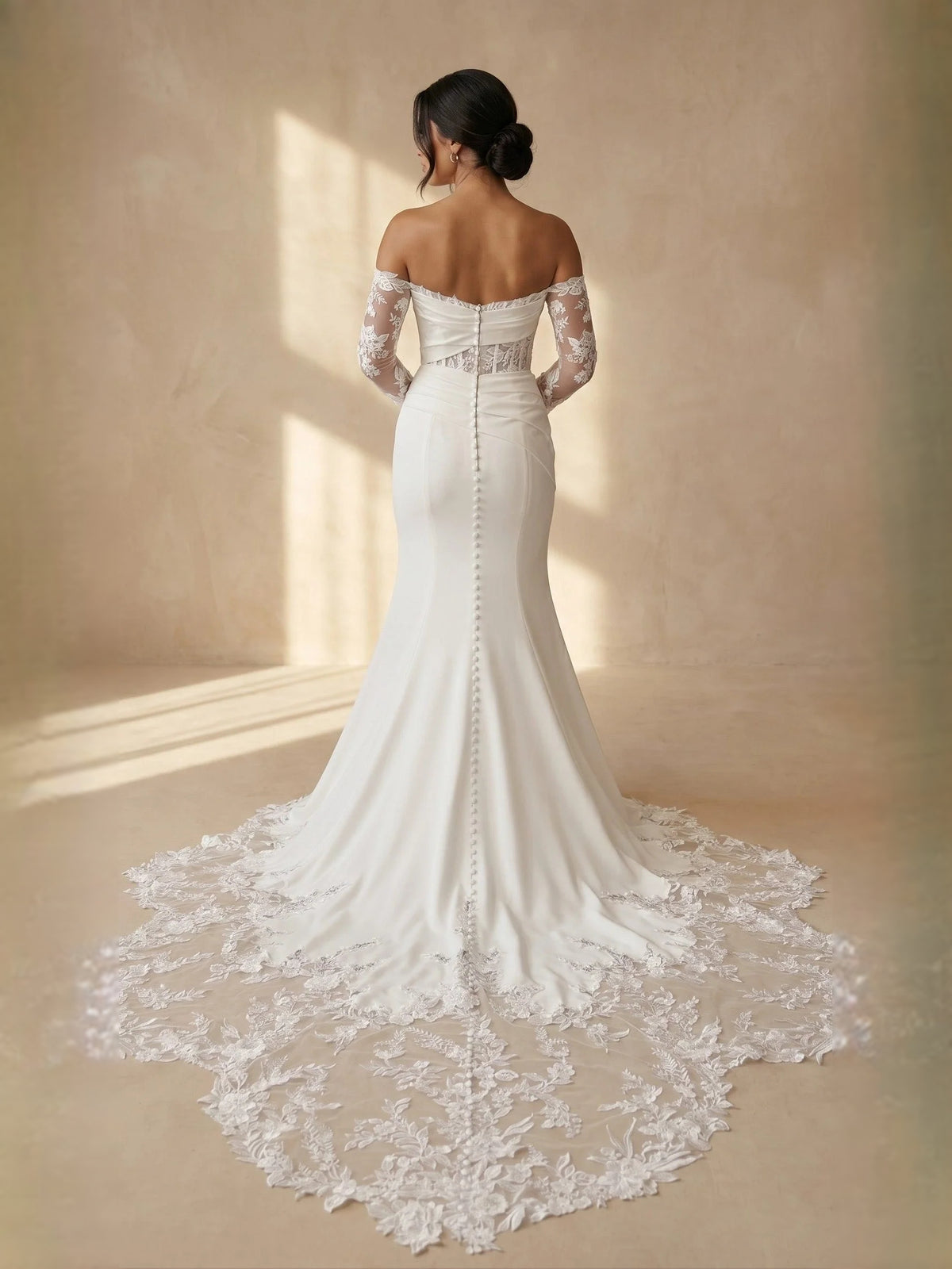 Ivory floor-length wedding dress, front view showing the mermaid silhouette