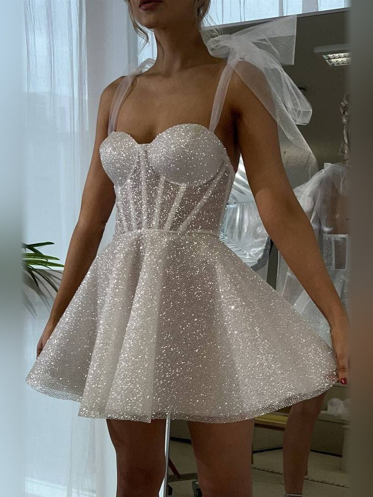 Silver mini homecoming dress, alternate view showing the full-length silhouette