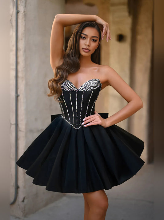Black mini homecoming dress, alternate view showing the full-length silhouette