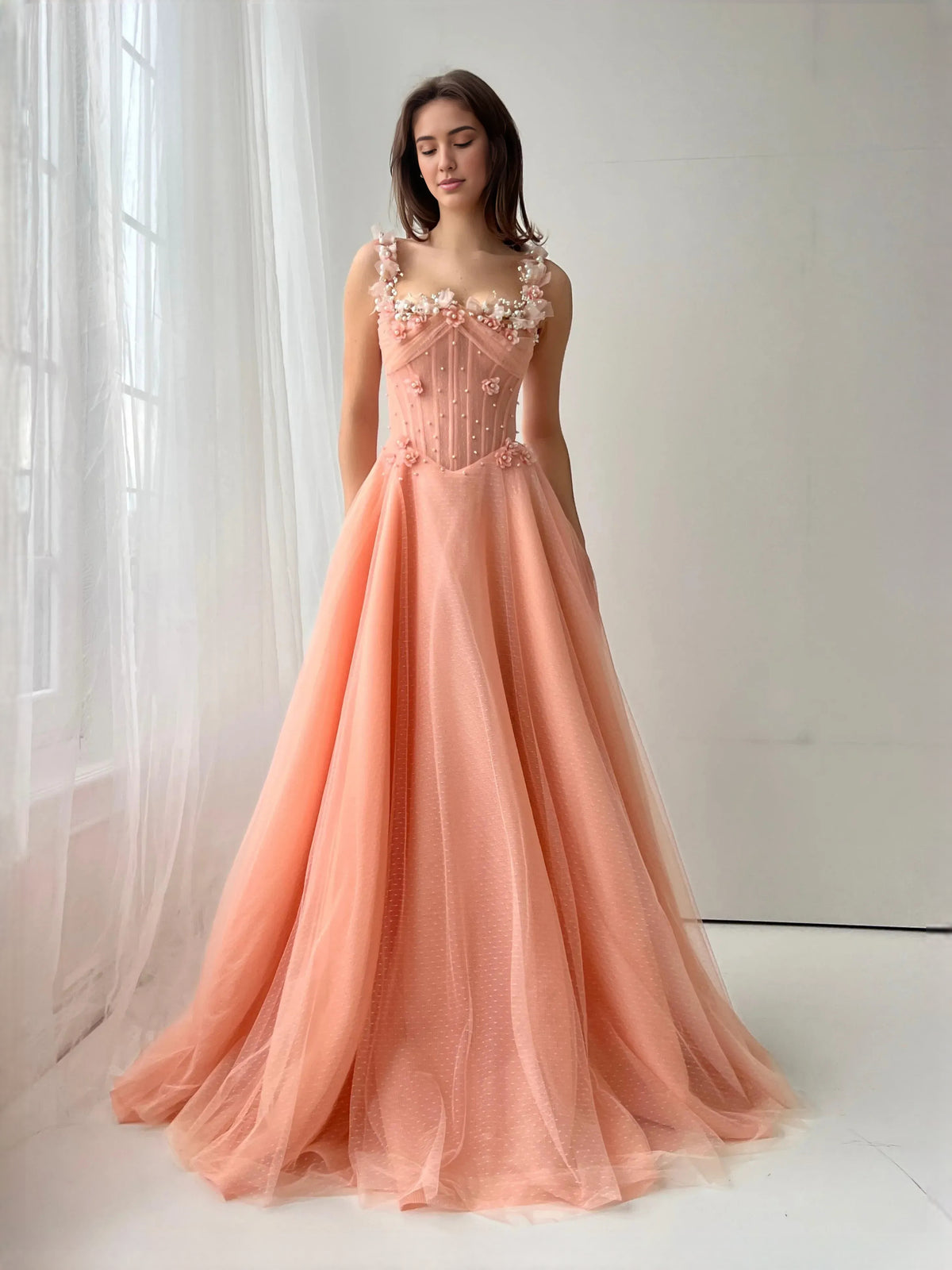 Apricot floor-length prom dress, front view showing the a-line silhouette