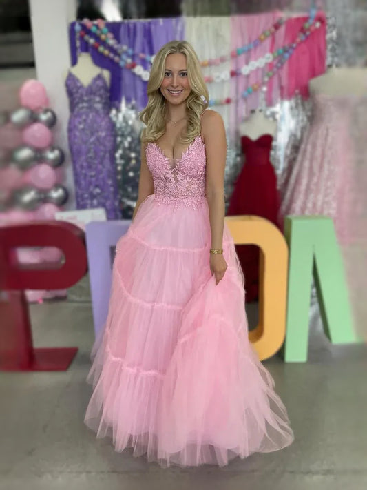 Pink maxi prom dress, front view showing the a-line silhouette