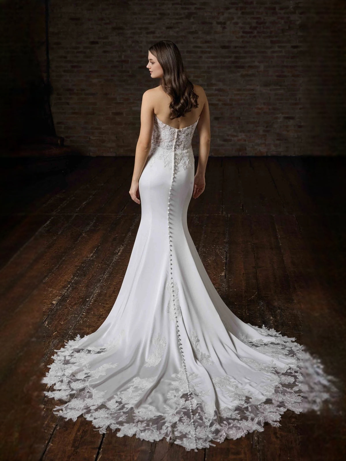 White floor-length wedding dress, front view showing the mermaid silhouette
