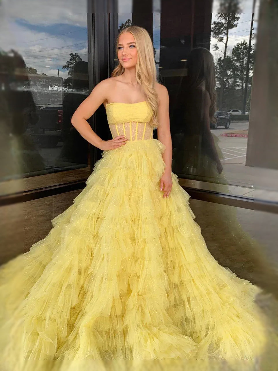 Yellow floor-length prom dress, front view showing the a-line silhouette