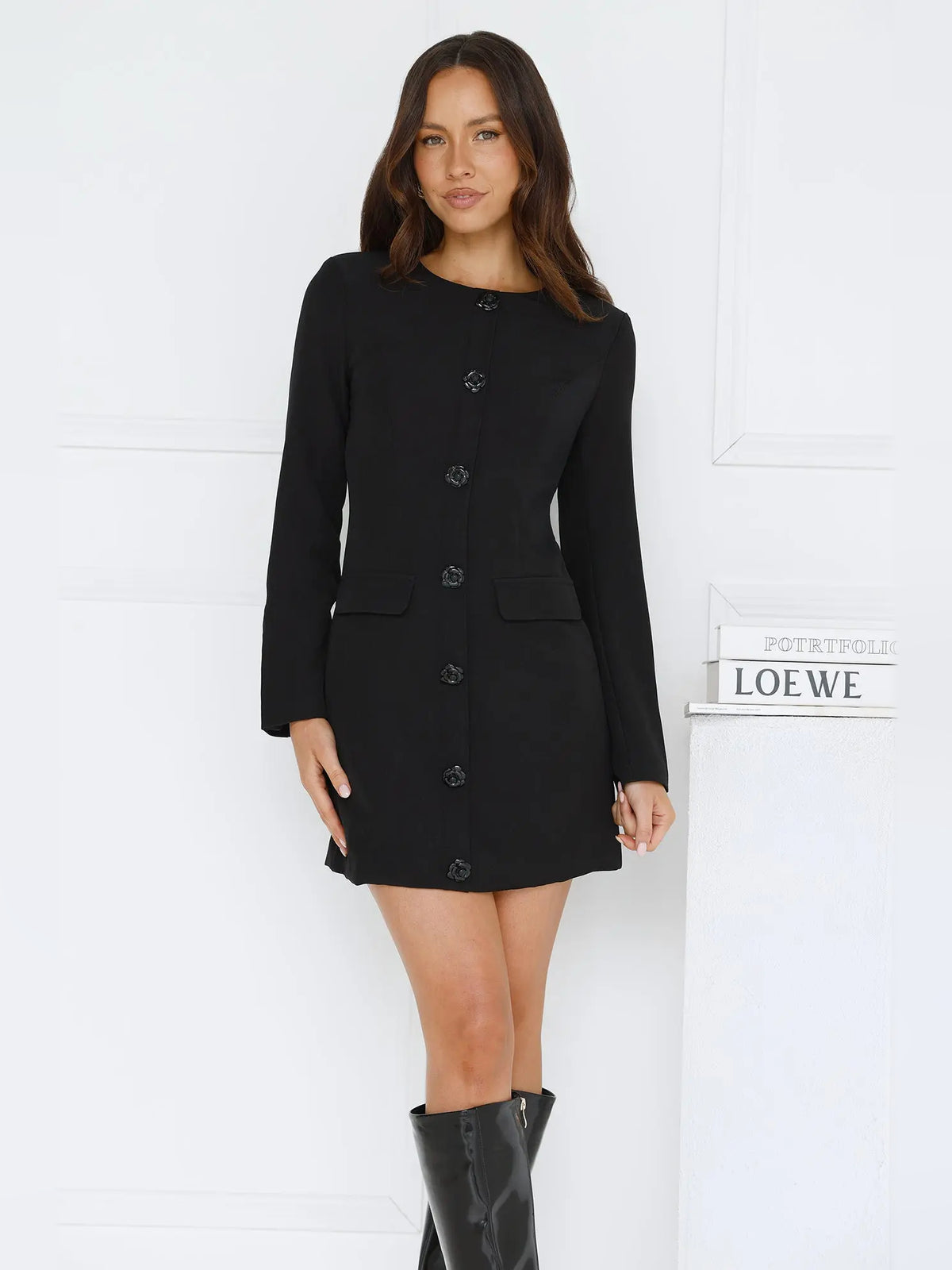 Black mini homecoming dress, front view showing the silhouette