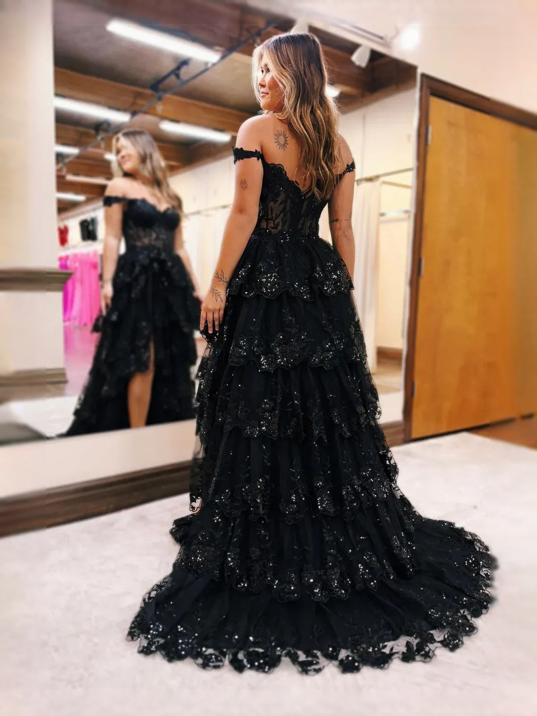 Black floor-length prom dress, front view showing the ball-gown silhouette