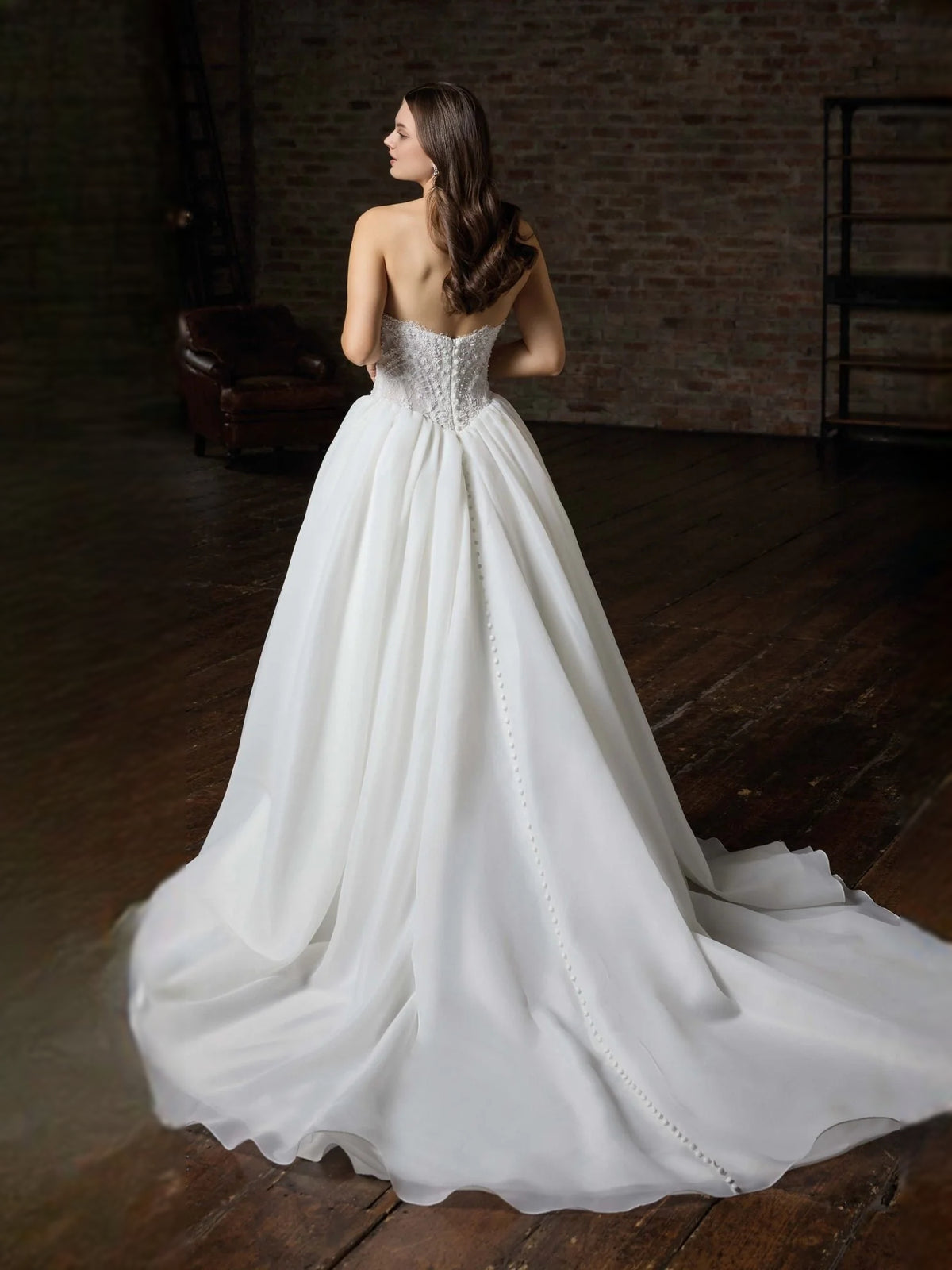 Ivory floor-length wedding dress, front view showing the ball-gown silhouette