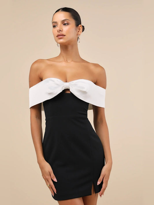 Black mini homecoming dress, front view showing the silhouette
