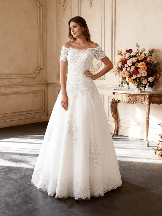 Ivory short wedding dress, front view showing the ball-gown silhouette