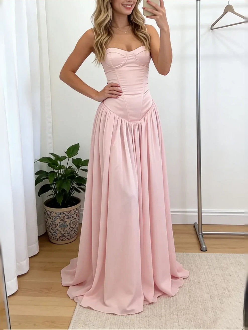 Pink floor-length prom dress, front view showing the a-line silhouette