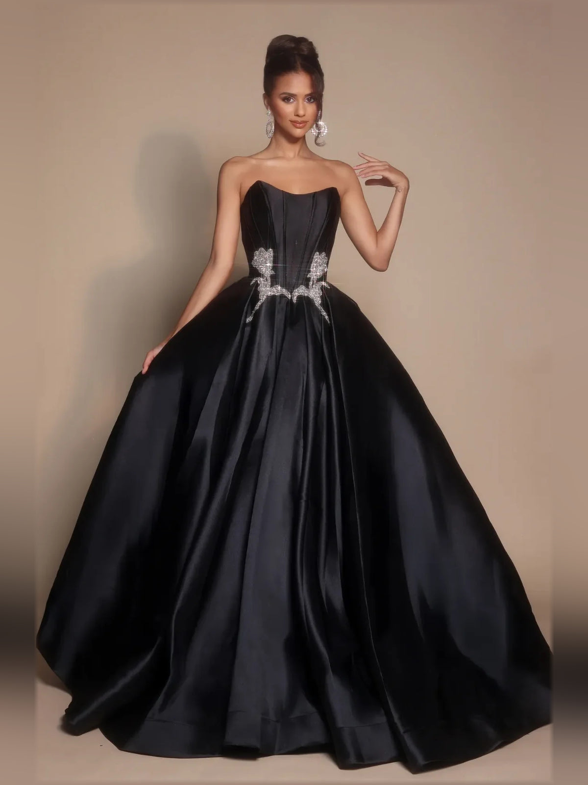 Black a-line floor-length formal dress with strapless neckline, full-length front view