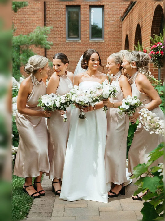 Champagne tea-length bridesmaid dress, front view showing the a-line silhouette