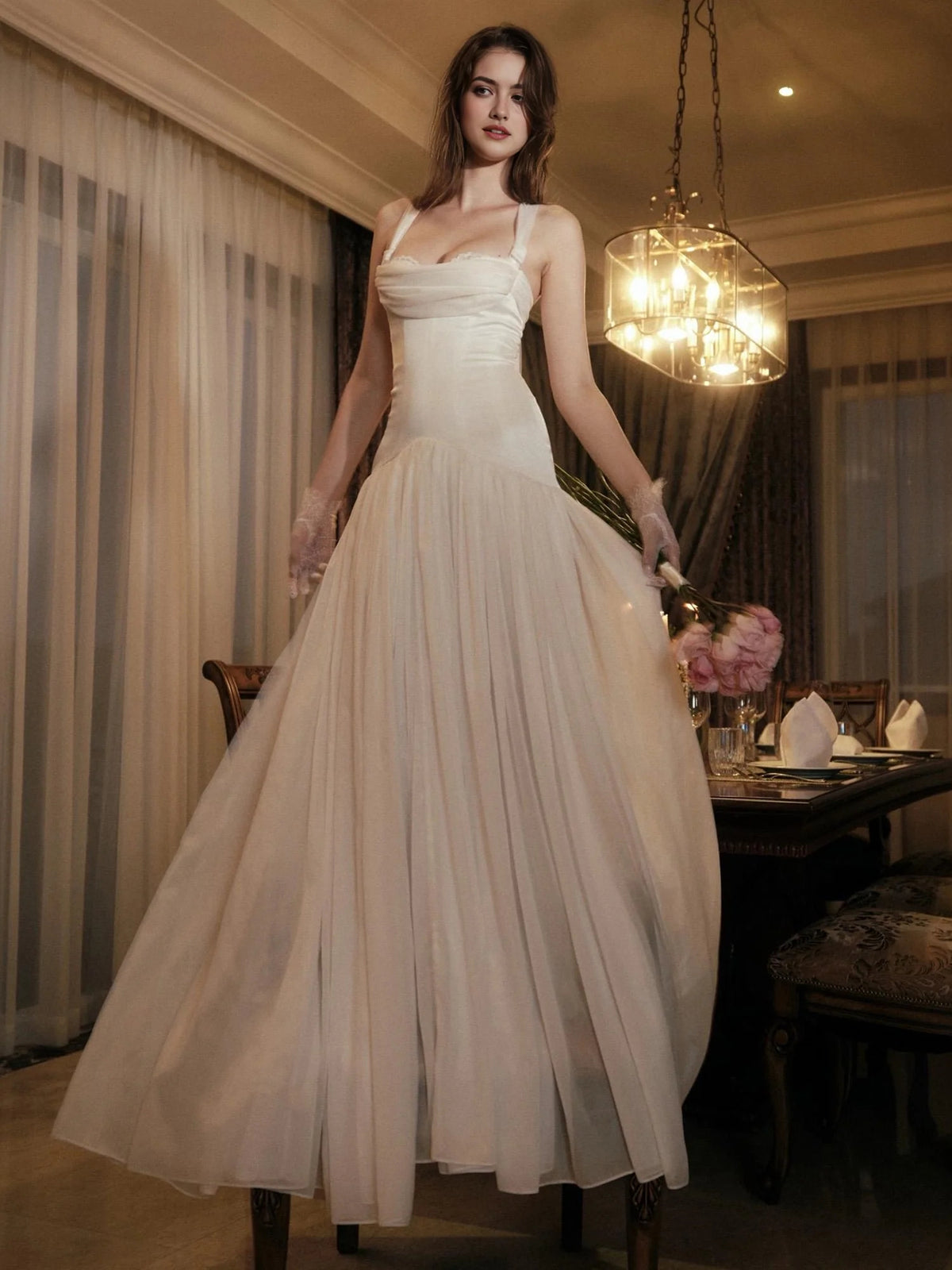 Ivory floor-length wedding dress, front view showing the a-line silhouette