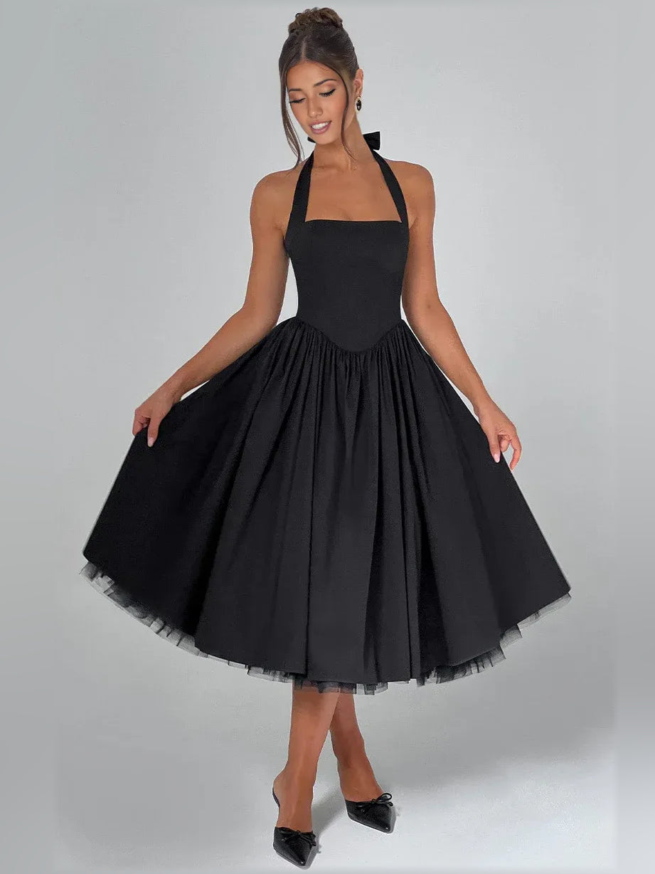 Black a-line midi formal dress with halter neckline, full-length front view