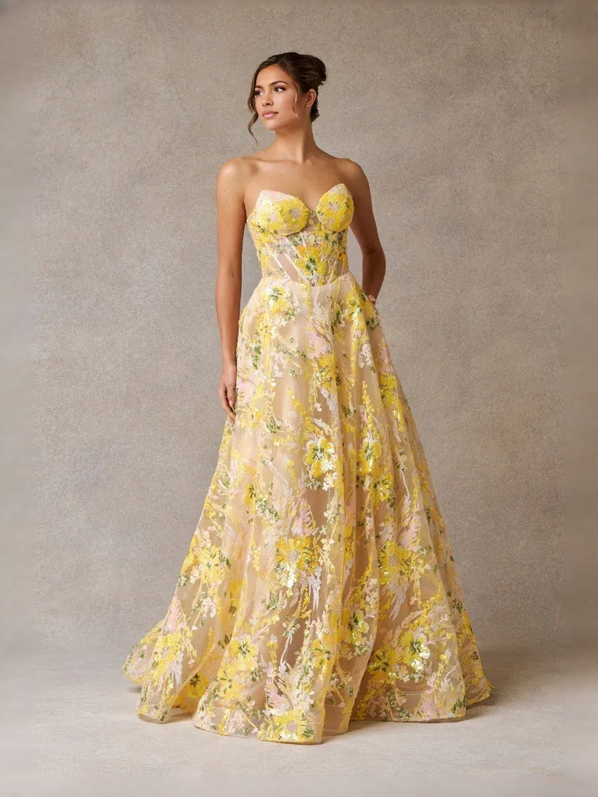 Yellow floor-length prom dress, front view showing the a-line silhouette