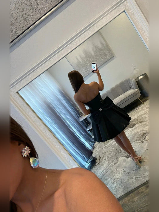 Black short homecoming dress, back view showing the rear of the dress