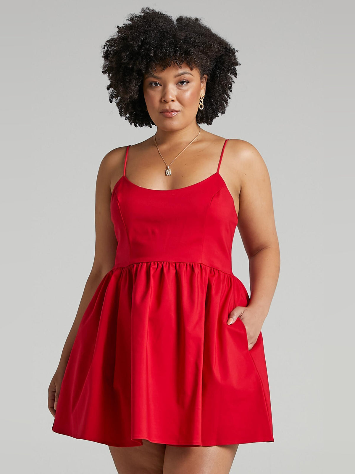 Red mini homecoming dress, alternate view showing the bodice and skirt