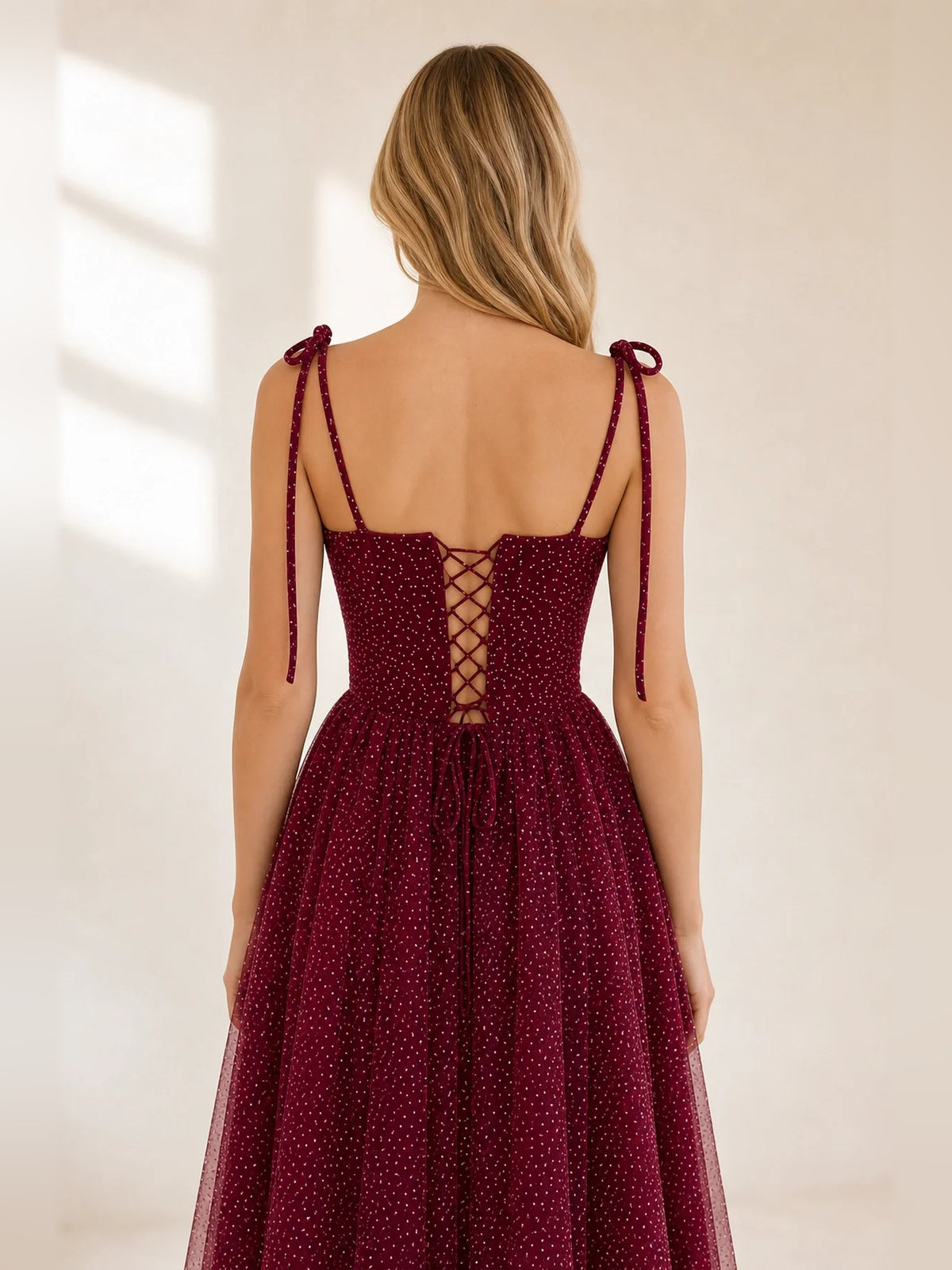 Burgundy midi homecoming dress, back view showing the rear of the dress