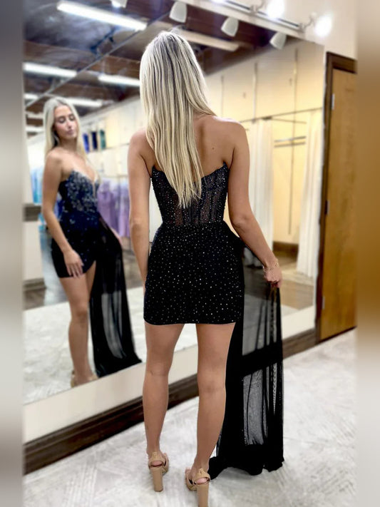 Black mini homecoming dress, back view showing the rear of the dress