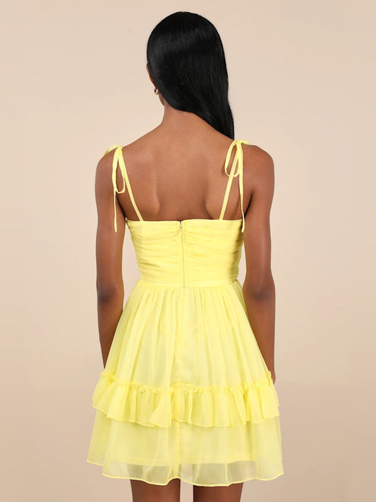 Yellow mini homecoming dress, alternate view showing the bodice and skirt