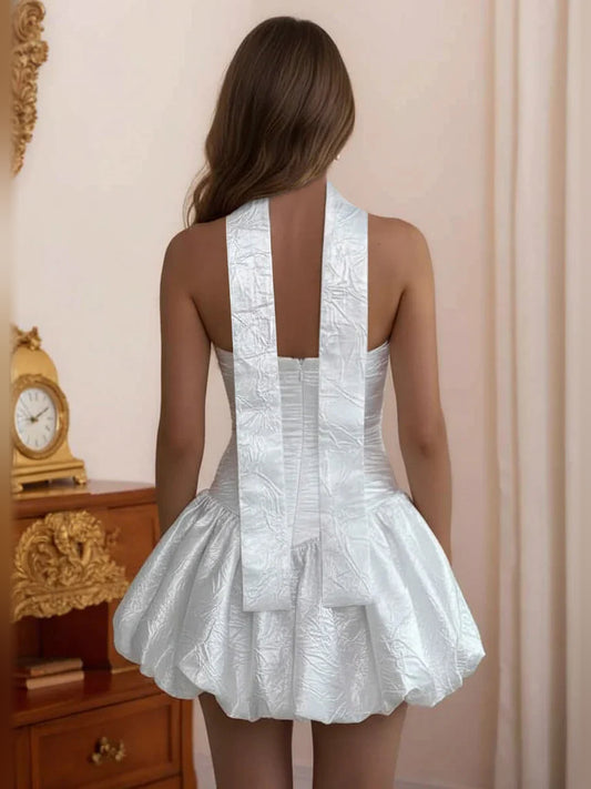 White mini homecoming dress, back view showing the rear of the dress