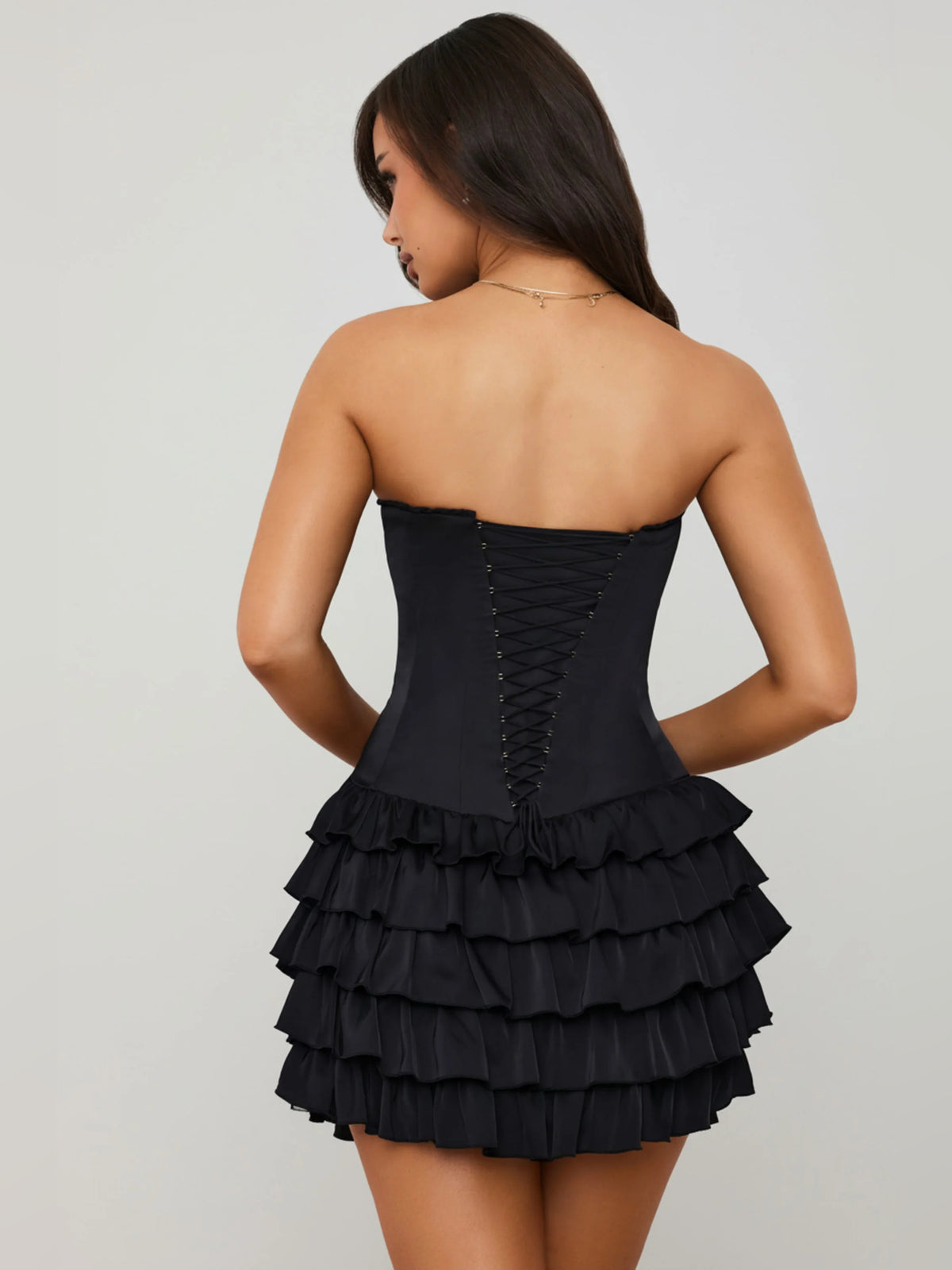 Black mini homecoming dress, alternate view showing the bodice and skirt