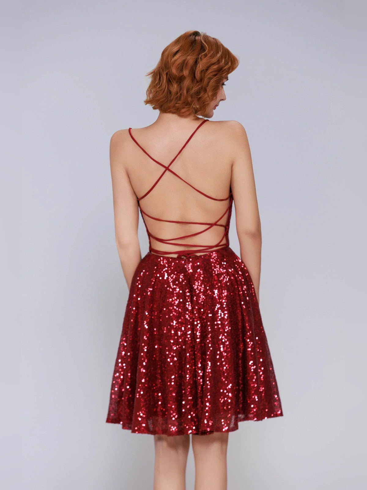 Burgundy mini homecoming dress, back view showing the rear of the dress